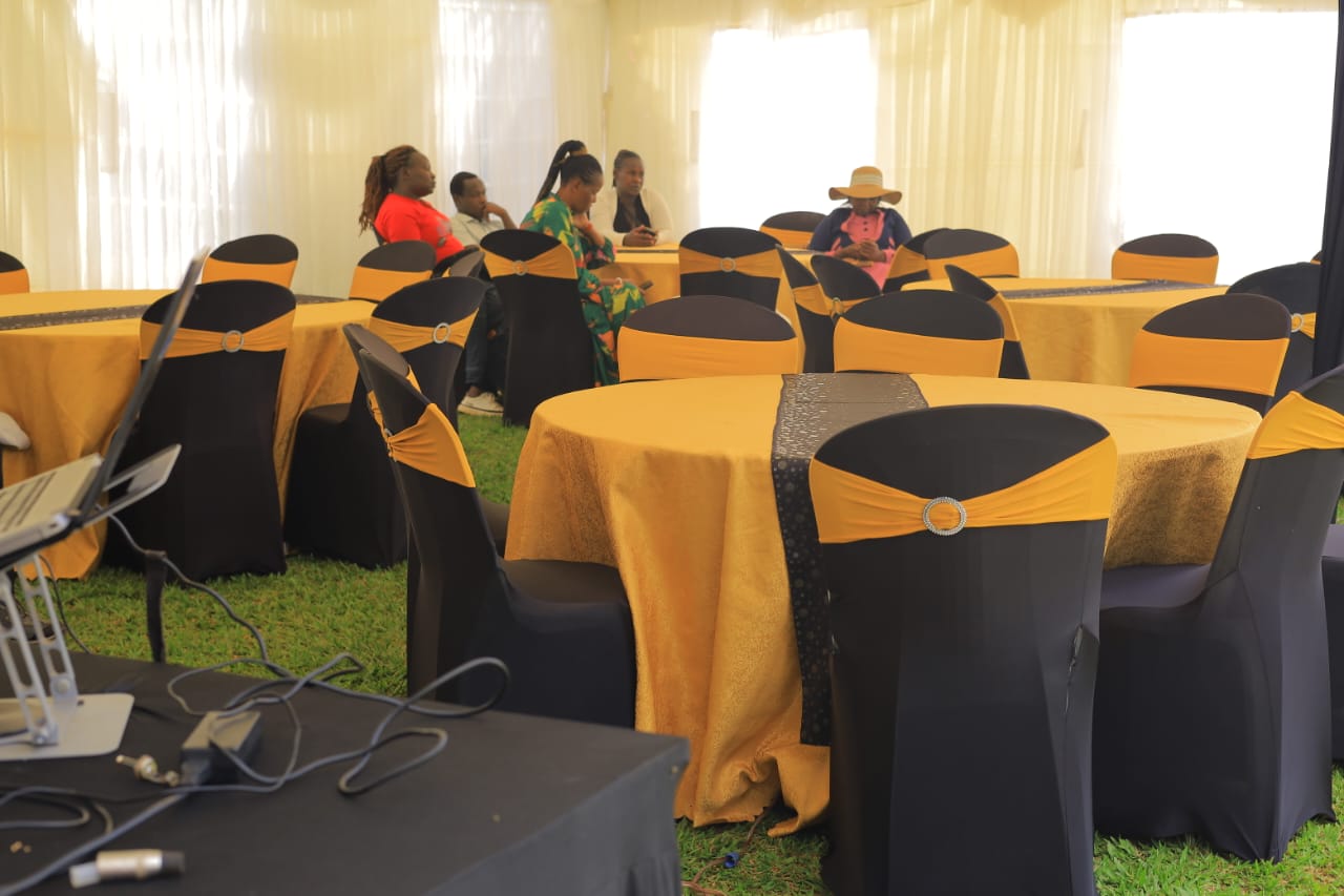 Elegant graduation party table setting with balloons and cake